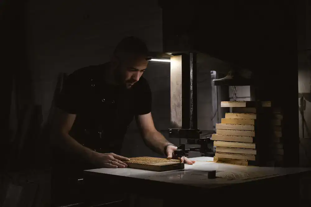 Carpenter working on precision sauna wood joints