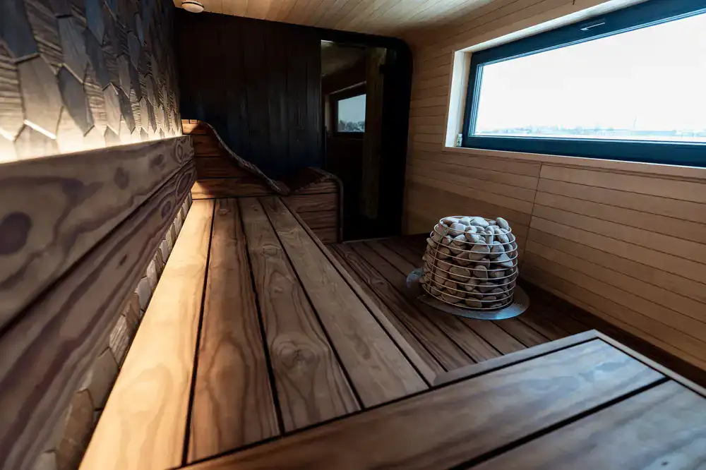 Sauna with large front-facing glass panels